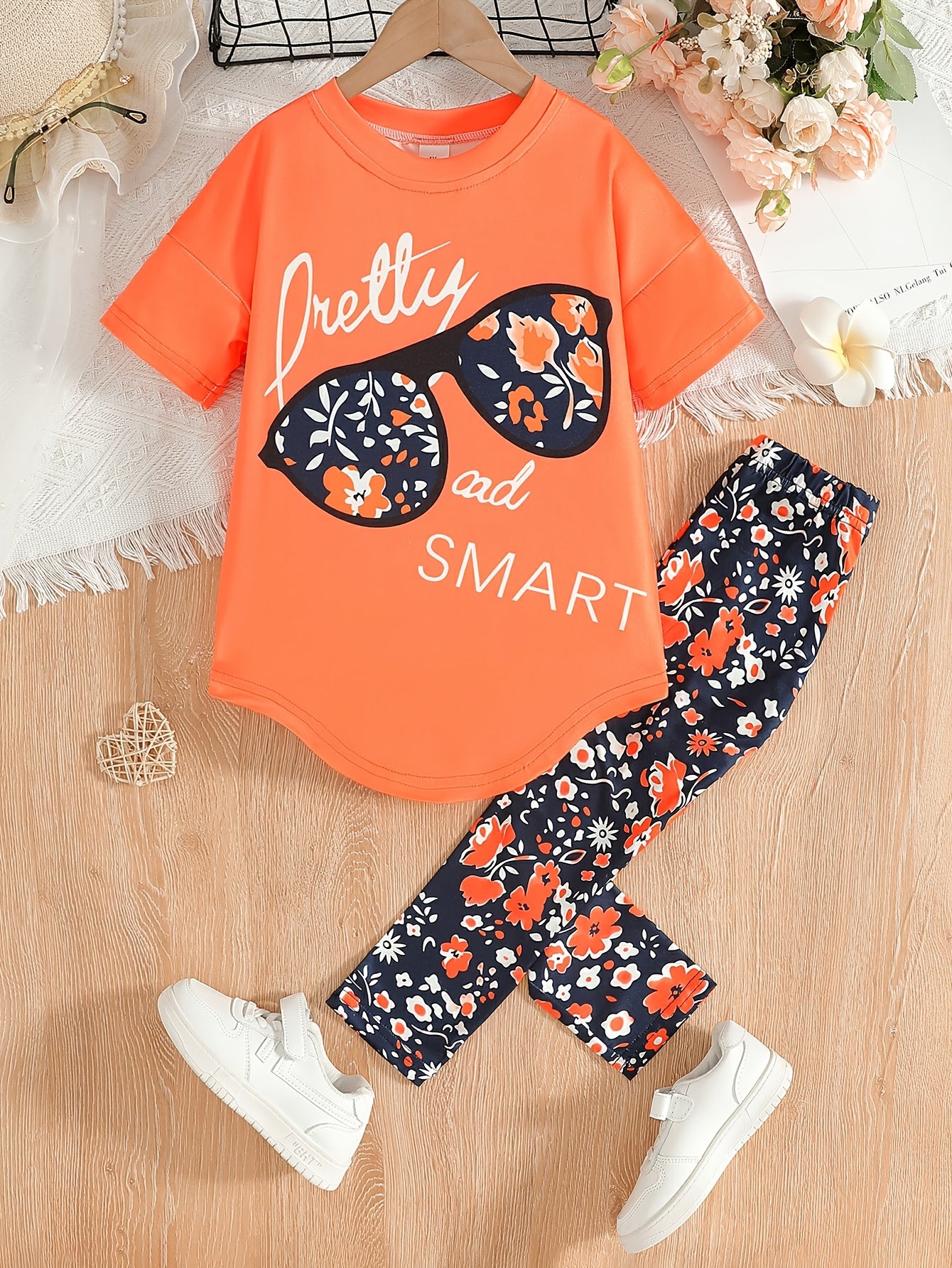 2pcs Girls' Clothing Party Slogan Large Glasses Print Pattern Drop Shoulder Irregular Hem Design Loose Short Sleeve T-Shirt + Floral Print Skinny Nine-Tenths Bottoms Set Girls' Summer Outfit Holiday Gift Girls' Fashion Casual Kids Suitable for Outdoors, P