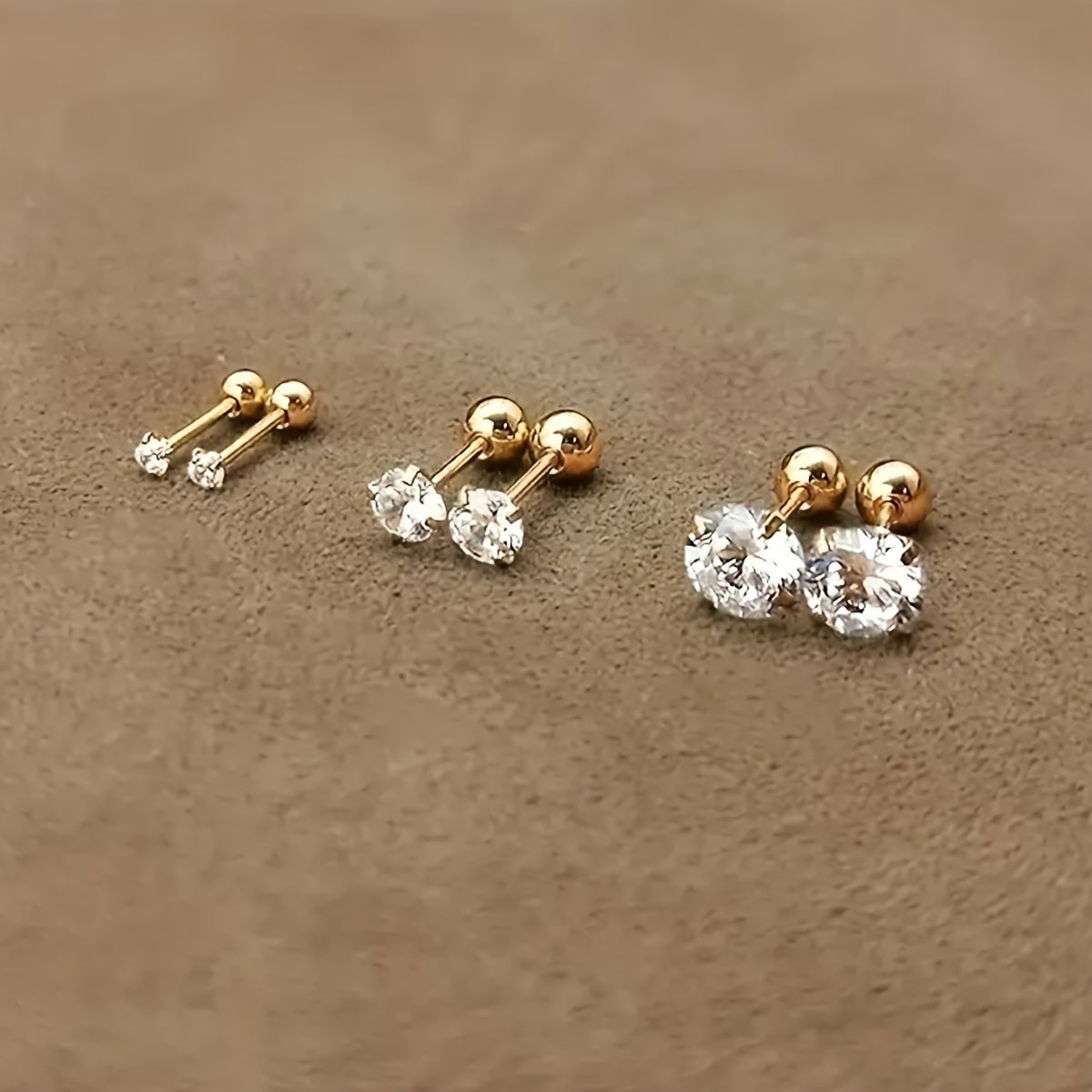 One or three pairs of stainless steel Golden four-prong twisted ball cubic Synthetic Zirconia earrings, simple and stylish jewelry suitable for daily wear by women