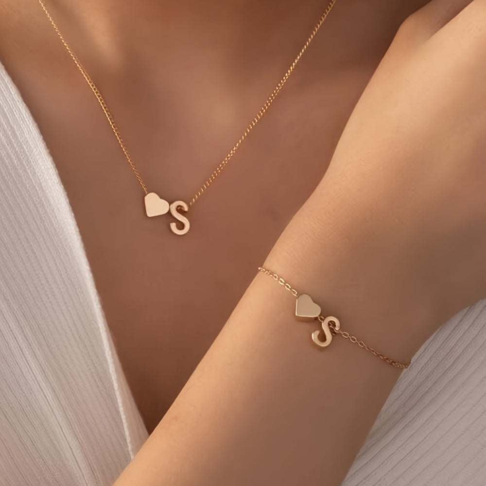 A Stylish And Minimalist Two-Piece Set Featuring a Metal Heart And English Letter Necklace And Bracelet, Perfect for Everyday Commuting Wear.