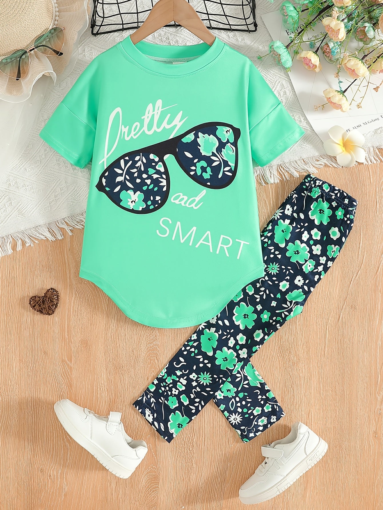 2pcs Girls' Clothing Party Slogan Large Glasses Print Pattern Drop Shoulder Irregular Hem Design Loose Short Sleeve T-Shirt + Floral Print Skinny Nine-Tenths Bottoms Set Girls' Summer Outfit Holiday Gift Girls' Fashion Casual Kids Suitable for Outdoors, P