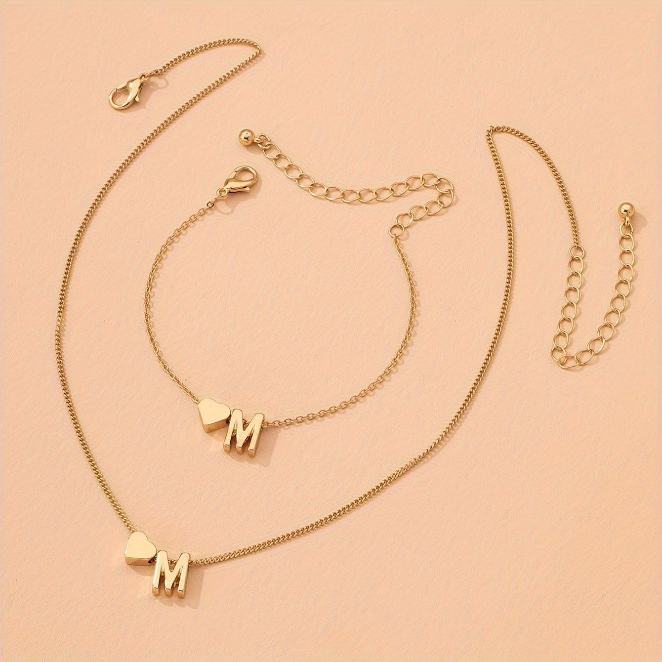 A Stylish And Minimalist Two-Piece Set Featuring a Metal Heart And English Letter Necklace And Bracelet, Perfect for Everyday Commuting Wear.
