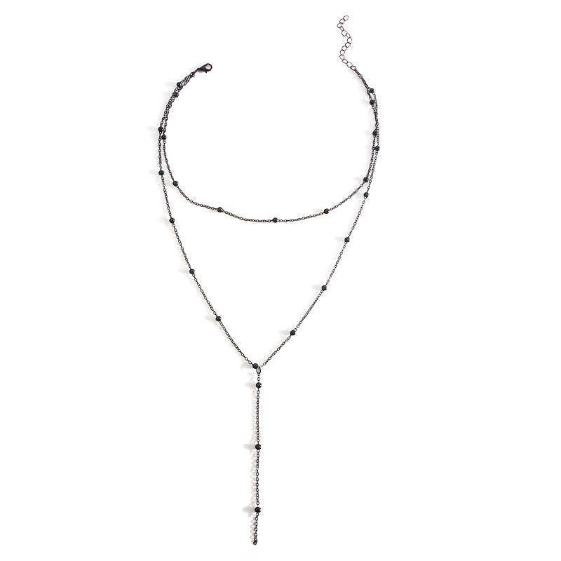 A Lady's Elegant And Fashionable Simple Multi-layer Y-shaped Long Necklace With A Golden Bead Chain That Sits On The Collarbone (random Number Of Beads, Fixed Length)