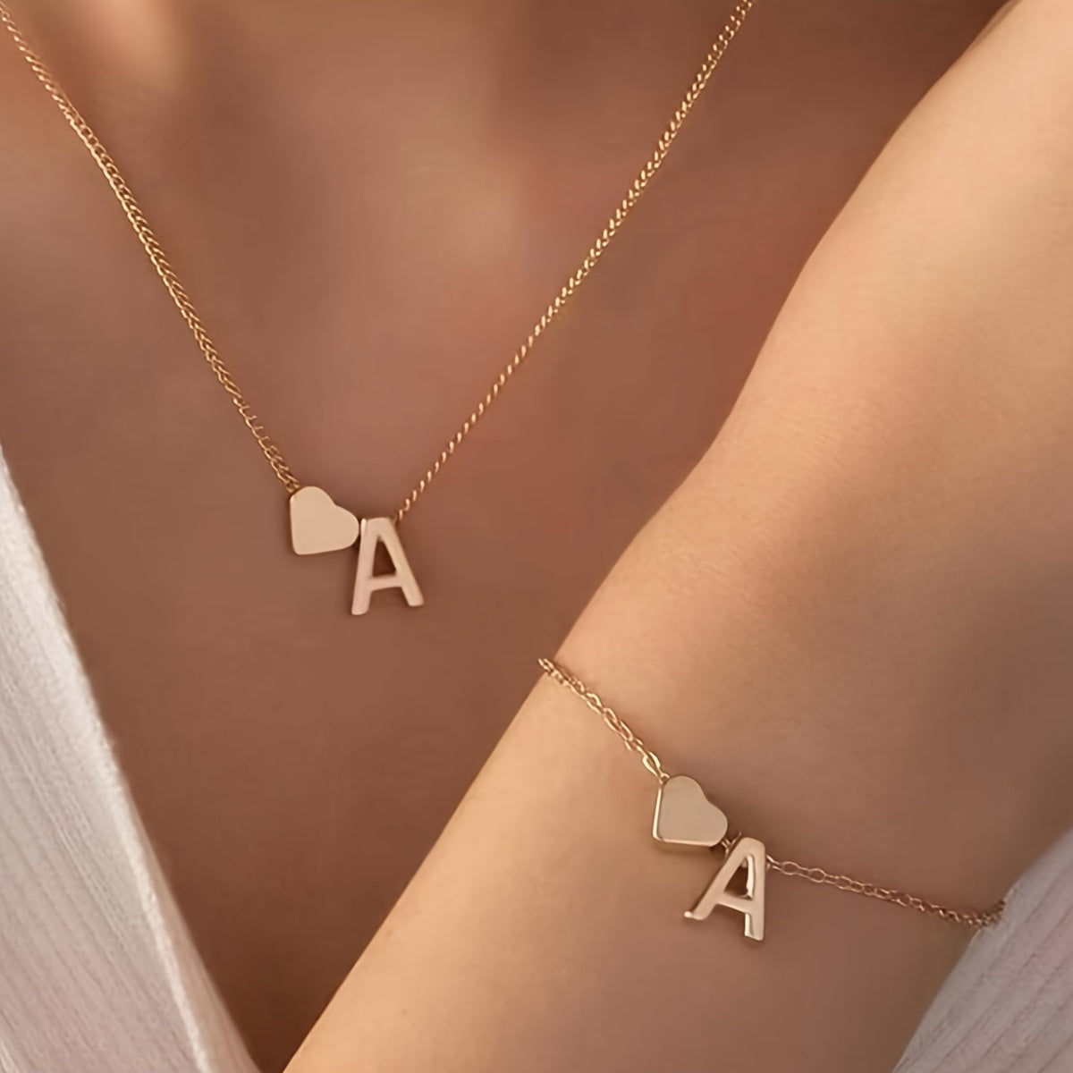 A Stylish And Minimalist Two-Piece Set Featuring a Metal Heart And English Letter Necklace And Bracelet, Perfect for Everyday Commuting Wear.